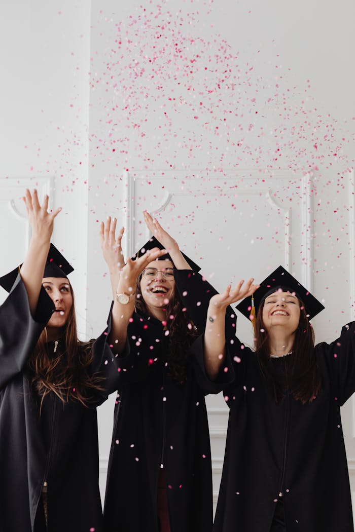 Young Girls Celebrating Their Graduation